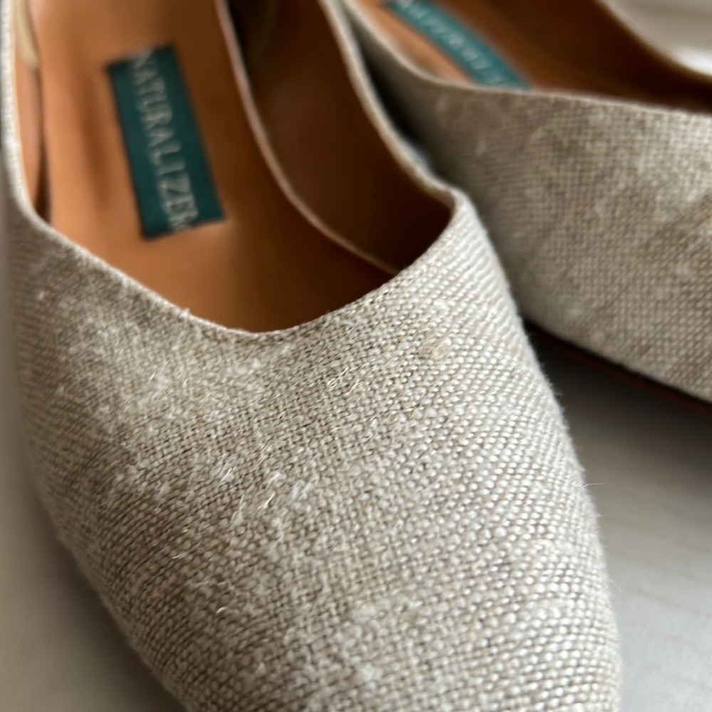 Naturalizer’s size 7 1/2. Slip on taupe colored fabric. Low heel.